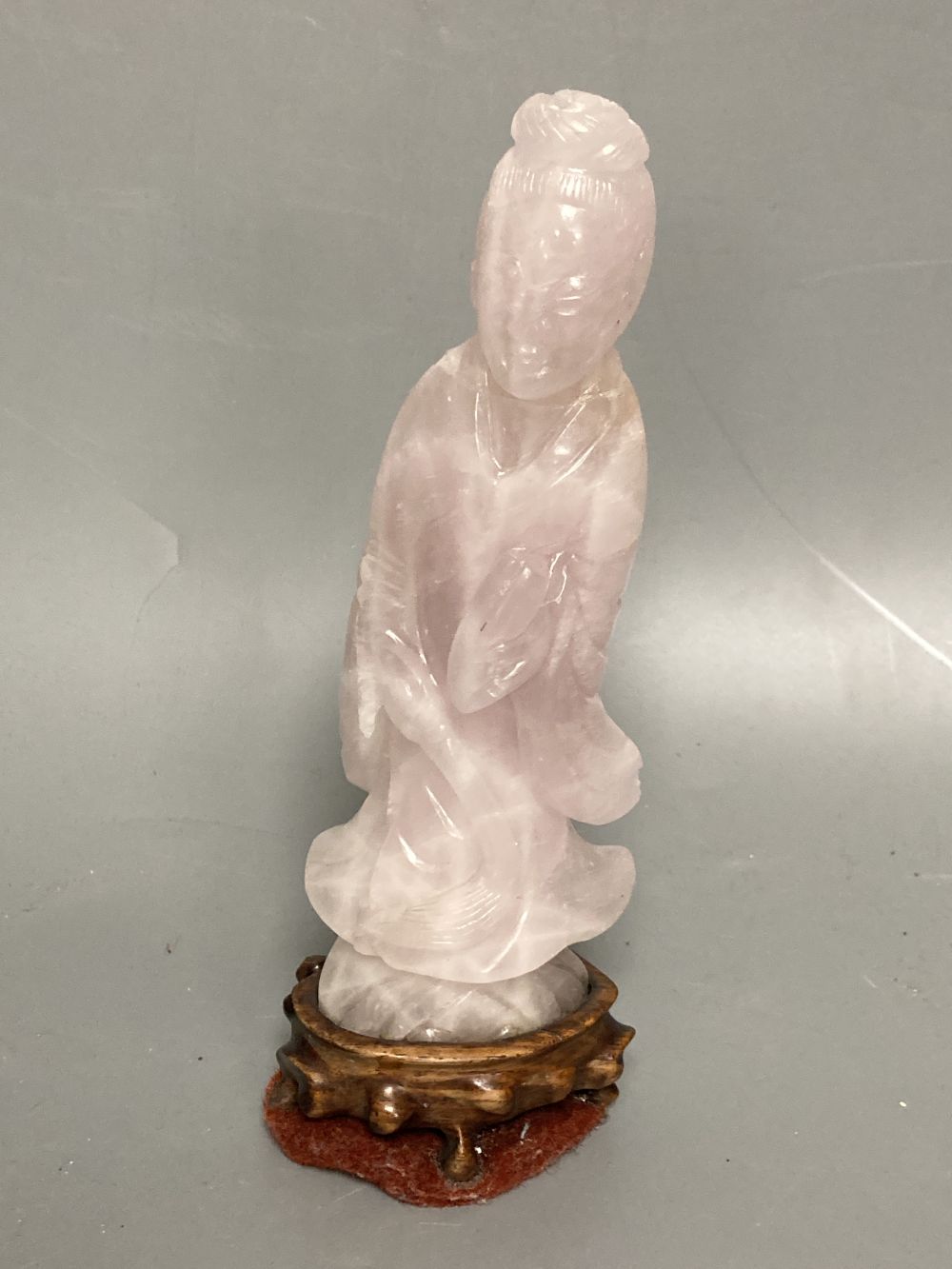 A group of Chinese soapstone, hardstone carvings and wood stands, 19th/20th century